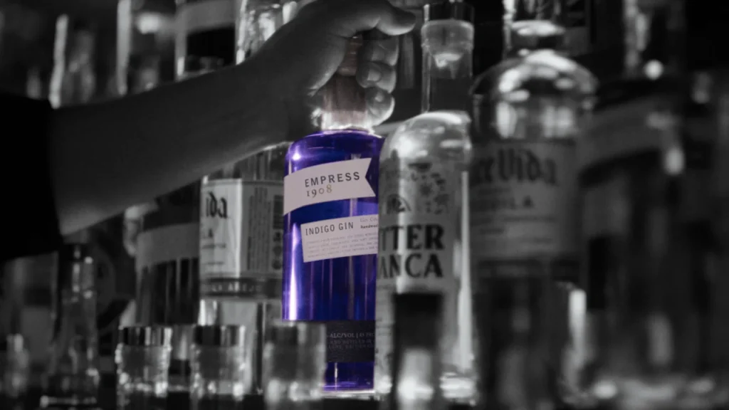 Pulling Empress 1908 Indigo Gin from bar